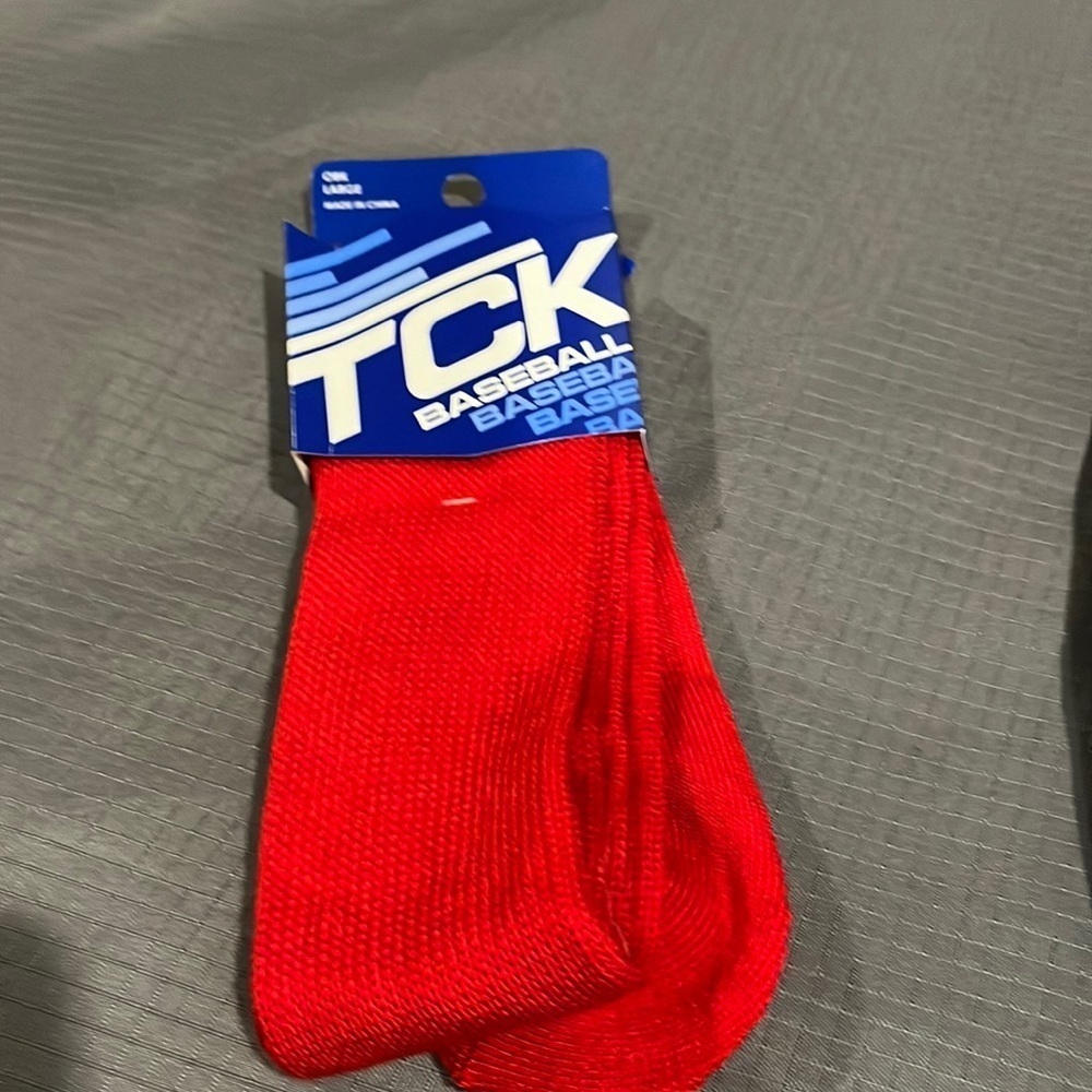 TCK red brand new baseball socks! Size large.